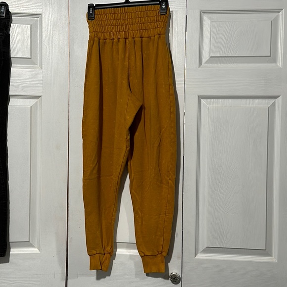 Mustard Urban Outfitters Puffy Pants with light bleach spots. - Picture 7 of 9